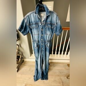 We are the Free Marci Denim Jumpsuit- Free People. Size S